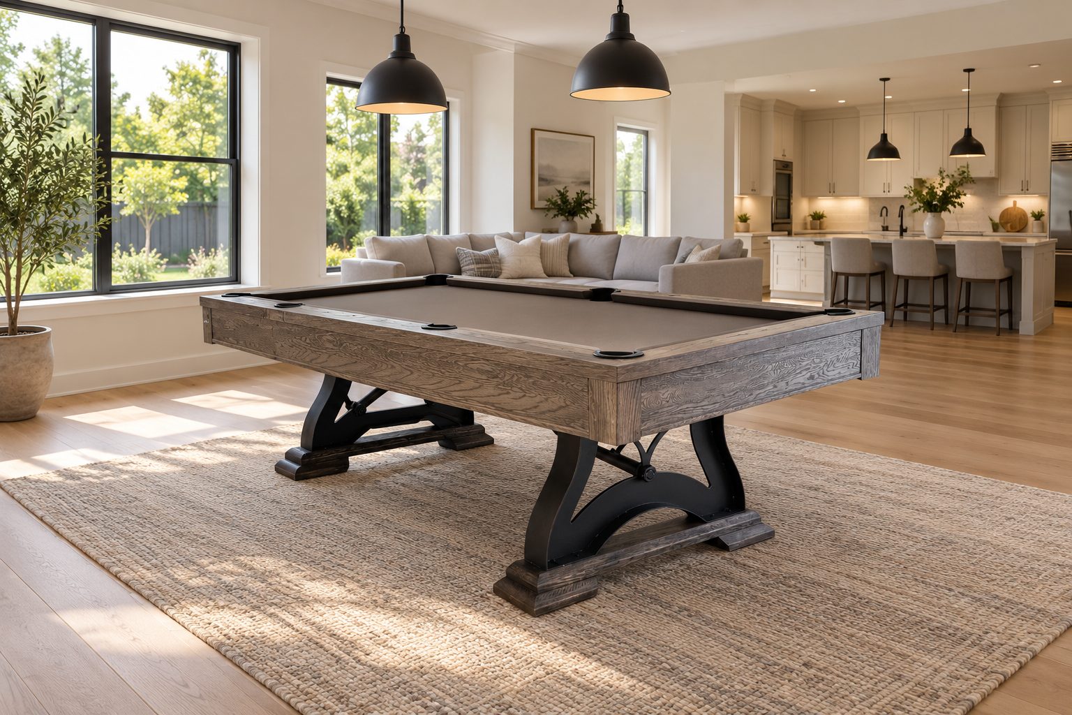 Sierra pool table in a bright family room with a kitchen behind